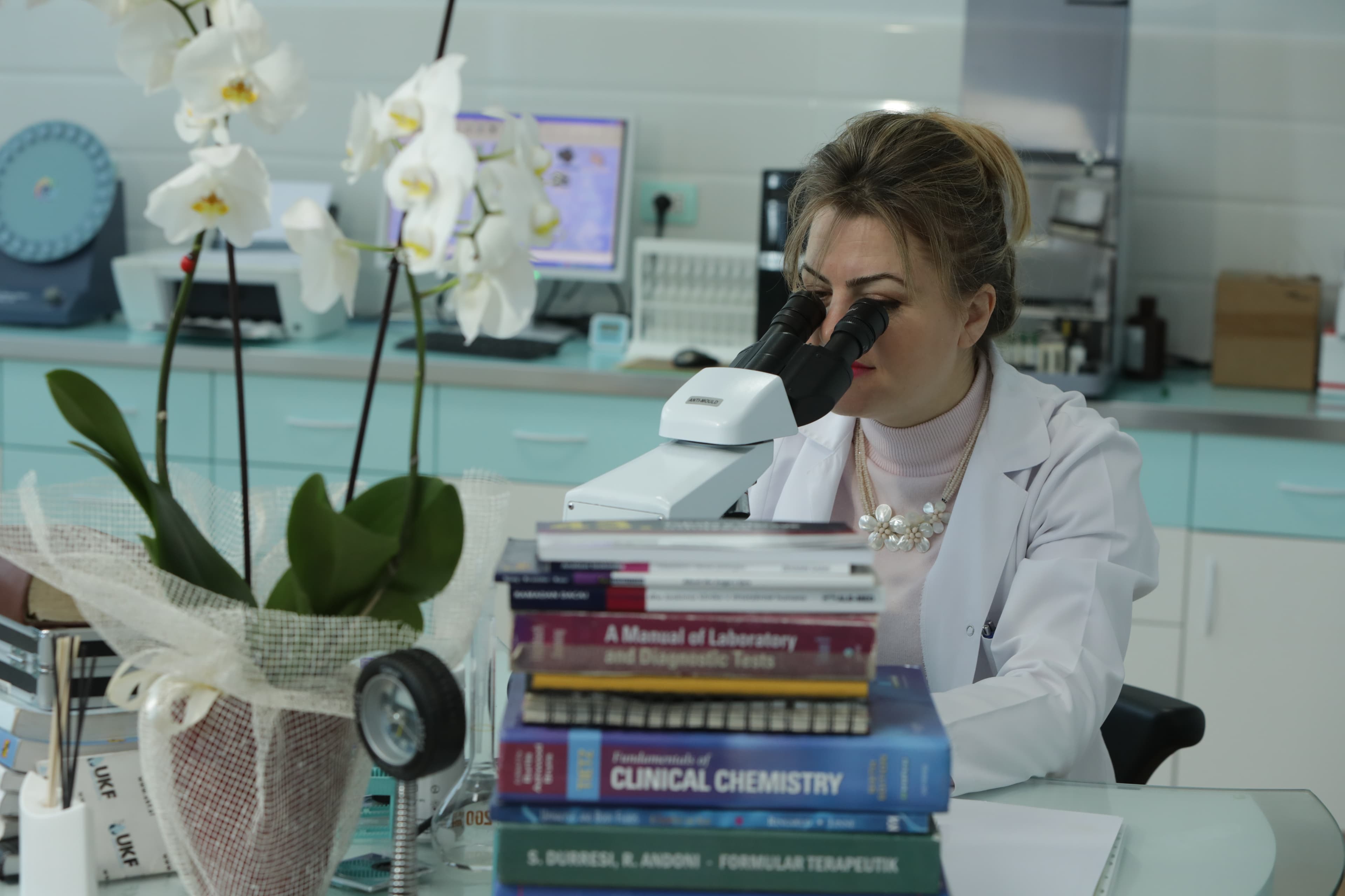Laboratory staff carefully working with samples
